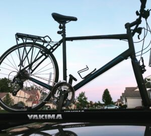 A Sirrus Sport road bike on a Yakima rack