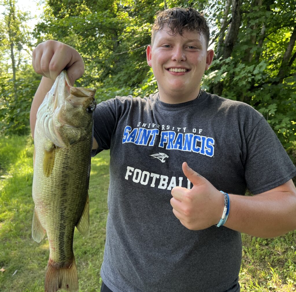 Nephew catching his first ever largemouth bass