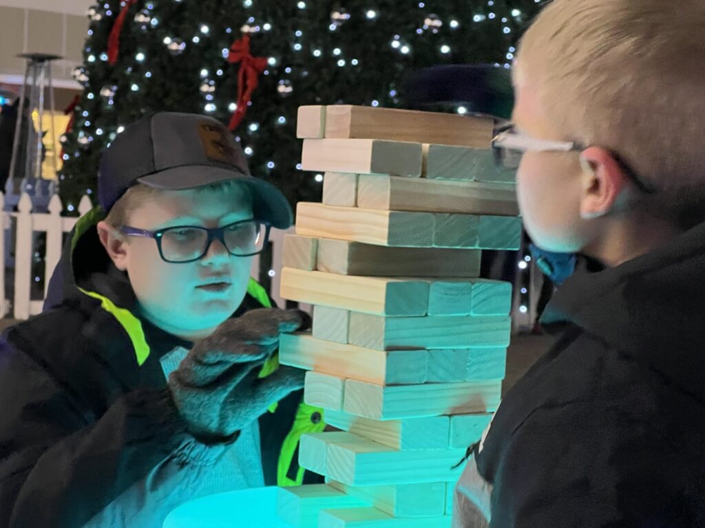 Playing Jenga at Happy Zoo Year